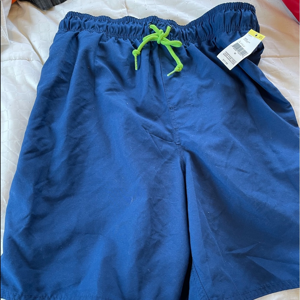 Never worn men’s medium swim trunks